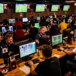 Fans enthusiastically placing bets on resultsfootball scores during a live sports betting event